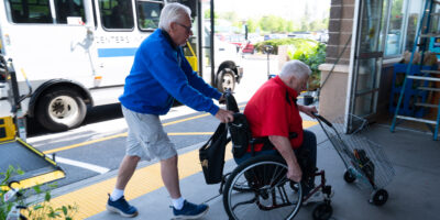 DSC06823 driver asists man in wheelchair